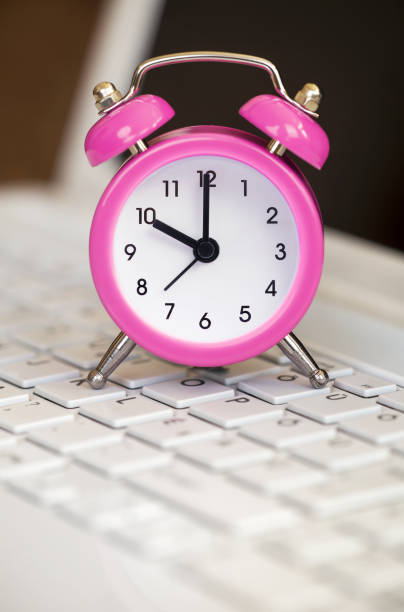 istock Save time, daylight savings, alarm clock on a laptop 1342115242