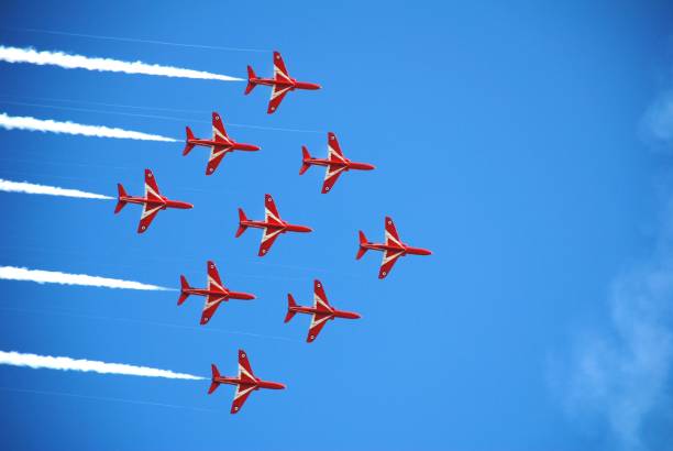 Eastbourne, England - August 14, 2010: Royal Air Force aerobatic display team The Red Arrows perform at the Airbourne airshow. The annual free event attracts thousands of visitors.