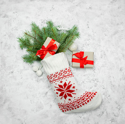 Male feet with white cotton socks isolated on white background