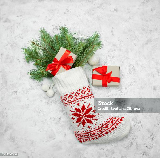 Christmas Stocking White With Fir Branches On A Light Background Stock Photo - Download Image Now
