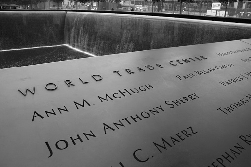 New York City, USA - September, 17 2011: Names engraved on the 9/11 Memorial at Ground Zero in Lower Manhattan on September 17, 2011.