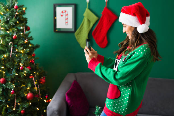 istock Showing my christmas tree on social media 1342116502
