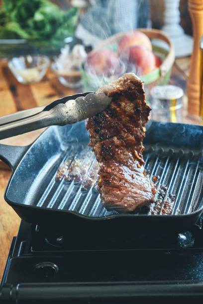 istock Roasting Steak in a Cooking Pan 1342116683