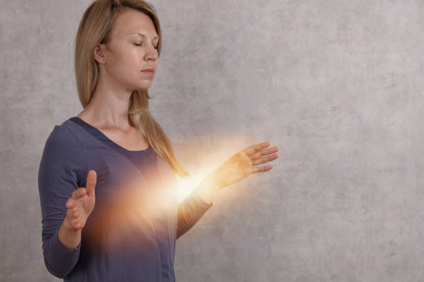 Visualization of interaction with healing energy. Spirituality and mystique concept
