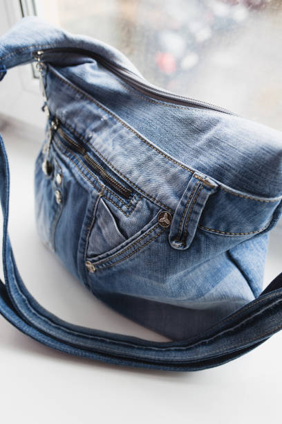 istock Casual female accessory denim textile bag in the interior 1342120097
