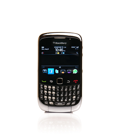 Istanbul, Turkey - August 08, 2011: Blackberry Curve 3G 9300 smartphone isolated on white background. BlackBerry is a line of mobile e-mail and smartphone devices developed and designed by Research In Motion since 1999.