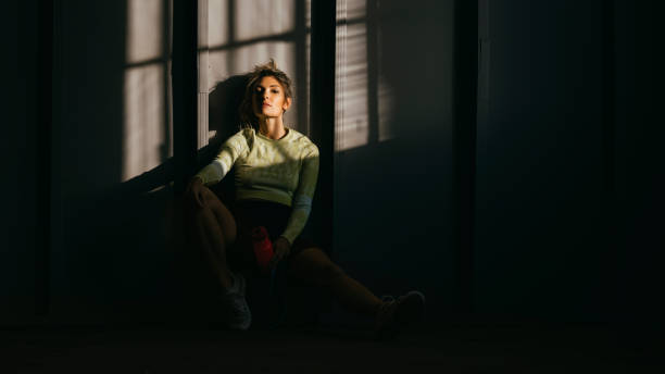 istock Serious Sporty Woman Looking at Camera 1342124384