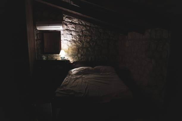 istock Bedside night illuminated light lamp stone room 1342124803