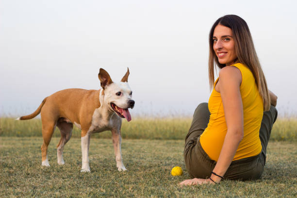 istock Woman enjoying time with her Dog 1342125499