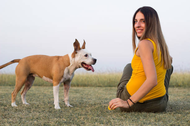 istock Woman enjoying time with her Dog 1342125769