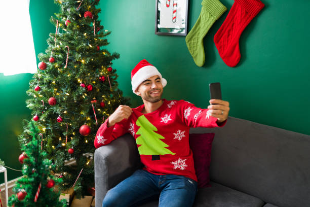 istock Young man posting on social media 1342125792