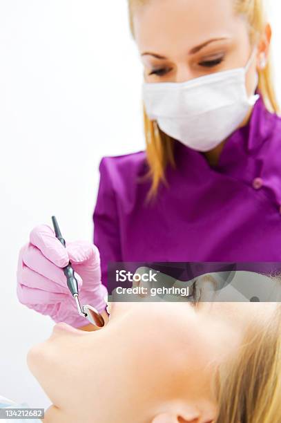 Visit At The Dentists Surgery Stock Photo - Download Image Now - 20-29 Years, Adult, Adults Only