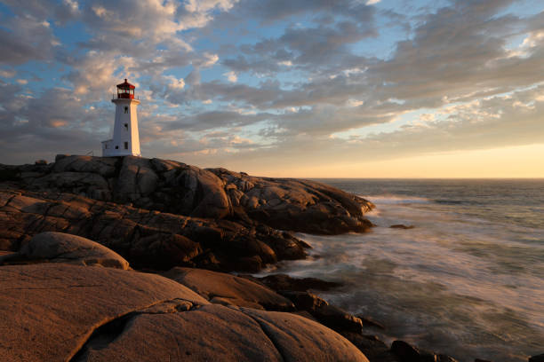 istock Light House at Peggy Cove at Sunset, Nova Scotia, Canada 1342128984