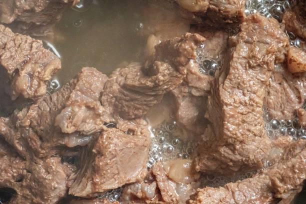 istock The meat is boiled in boiling water 1342131328
