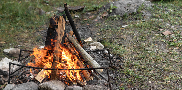 Firewood is burning, for further cooking