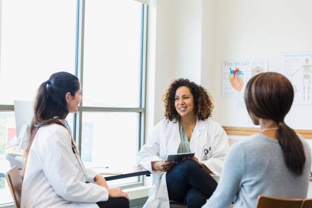 istock Two female doctors meet with patient 1342134444