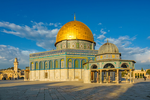 The landmark Dome of the Rock Mosque in Jerusalem at sunrise.