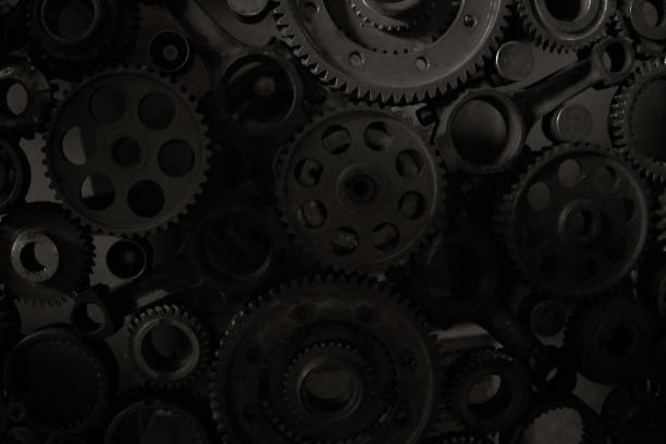 Industrial background with metal gear wheels of a car engine