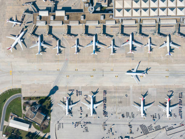 Aerial view of an airport. Airport, Airplane, Airport Runway, Commercial Airplane airport aerial view stock pictures, royalty-free photos & images