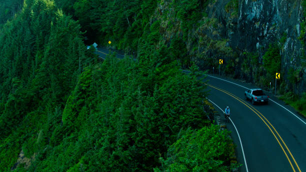 istock Bikepacker on Oregon Coast Highway - Aerial 1342140733