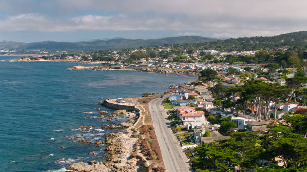 Residential Neighborhood in Pacific Grove, California - Aerial Aerial shot of Pacific Grove, a small city in Monterey County, California. 

Shot by FAA licensed drone pilot with permit from the City of Pacific Grove. monterey bay stock pictures, royalty-free photos & images
