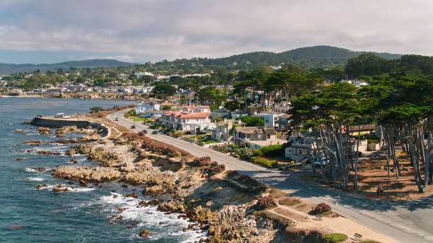 Coastal Road in Pacific Grove, California Aerial shot of Pacific Grove, a small city in Monterey County, California. 

Shot by FAA licensed drone pilot with permit from the City of Pacific Grove. city of monterey california stock pictures, royalty-free photos & images
