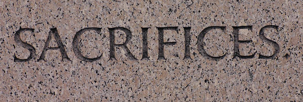 Word Sacrifices Carved in Gray Granite Sacrifice