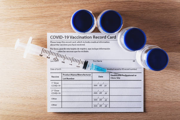 istock Covid-19 Vaccination Record Card 1342147583