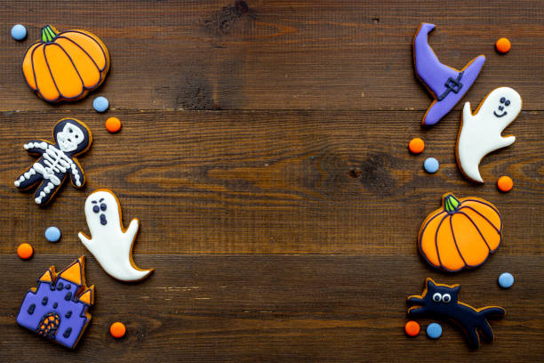 istock Funny halloween cookies and sweets flat lay, top view 1342150571