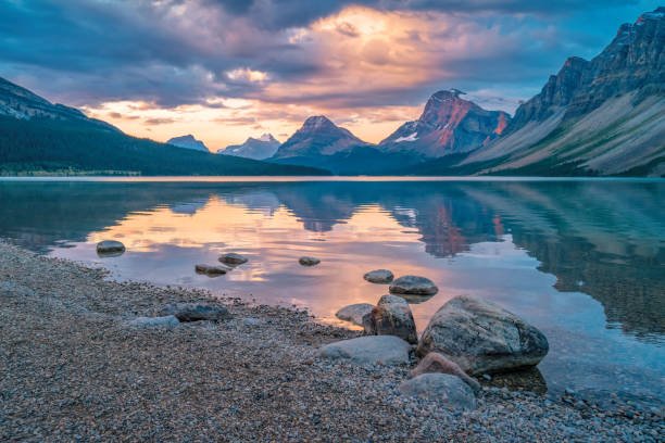 Canadian Rockies Banff National Park Dramatic Landscape Landscape at Bow Lake in Banff National Park, Alberta, Canada at sunrise. bow river stock pictures, royalty-free photos & images
