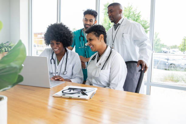 istock cheerful hospital staff on a video conference call 1342154718