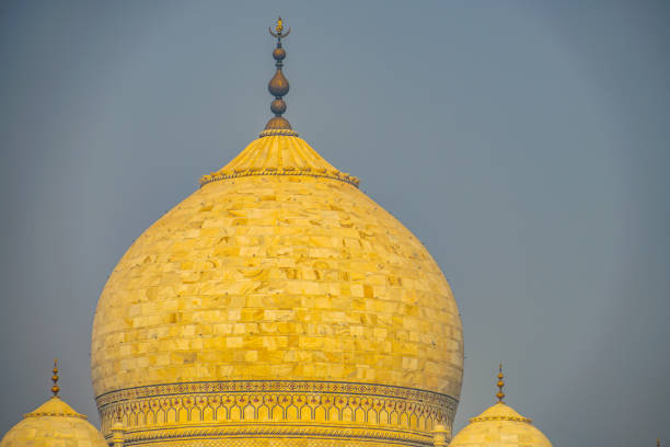 The Taj Mahal, which is wrapped in a sunset (India, Agra). Shooting Location: India