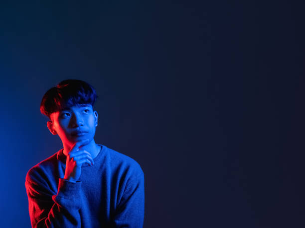 pensive man neon light people blue advertising