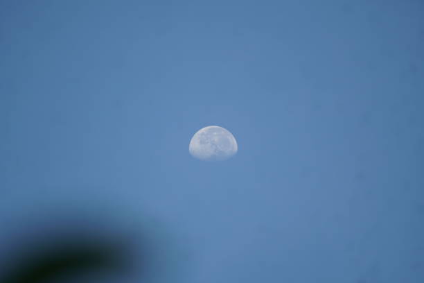 Moon in afternoon stock photo