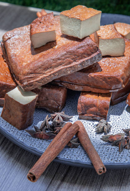 istock Traditional black herb tofu on ceramic plate. 1342156236