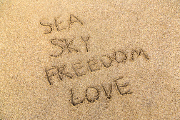 istock Sea, sky, freedom, love on sand 1342157204
