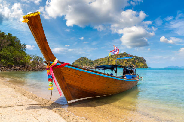 Thai traditional longtail boat Thai traditional wooden longtail boat at tropical beach in Thailand koh tao thailand stock pictures, royalty-free photos & images