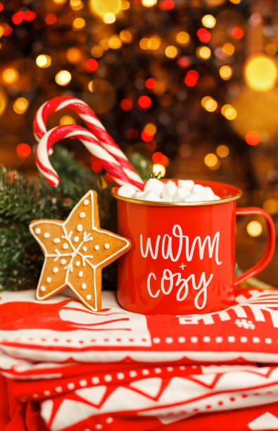 istock Merry Christmas greeting card. Hot chocolate infront Xmas tree. 1342166048