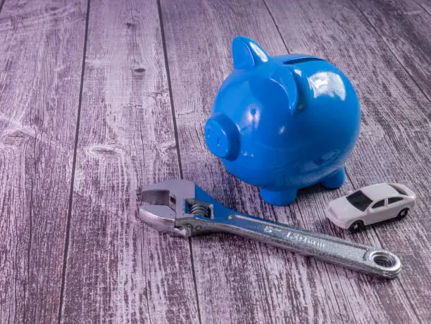 The blue piggy bank and car for saving or car concept