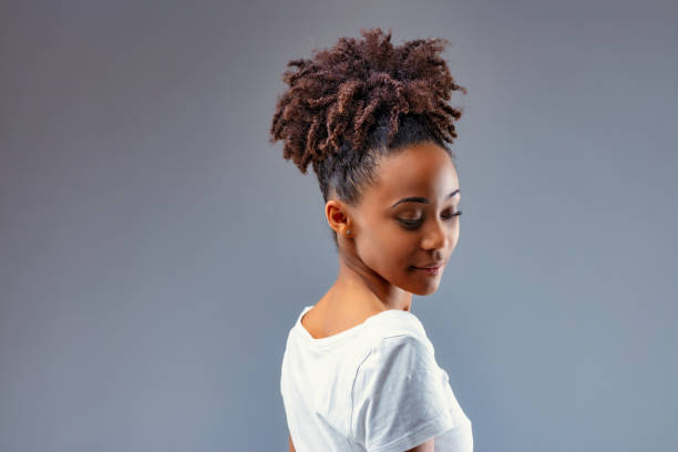 istock Sensual beautiful young woman with downcast eyes 1342171245