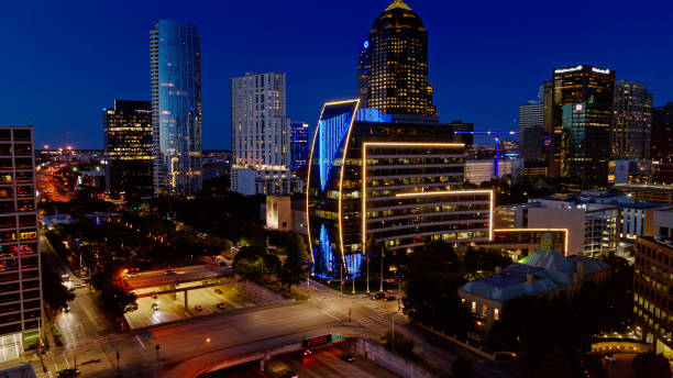istock Freeway Going Under Park Between Illuminated Skyscrapers at Night in Dallas, Texas 1342174046