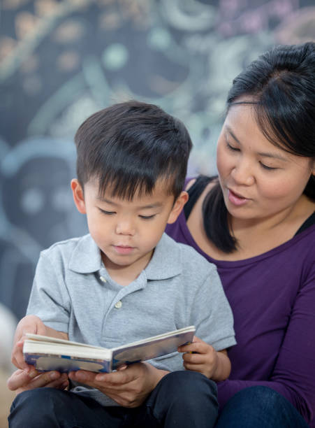 istock Mother and Son Reading Together 1342174217