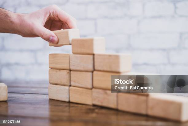 Bricks Building Up Hand Building Up Blocks Stock Photo - Download Image Now - Brick ...