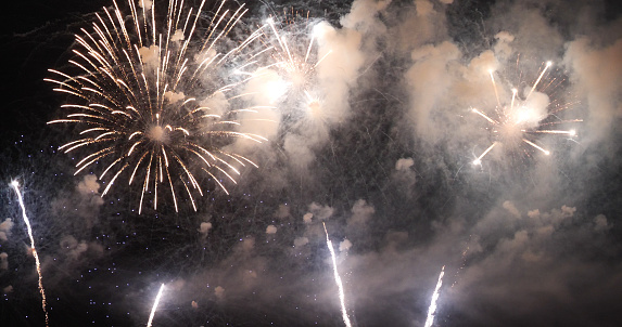 Firework celebrate anniversary happy new year 2022, 4th of july holiday festival. colorful firework in the night time to celebrate national holiday. countdown to new year 2022 party time event.
