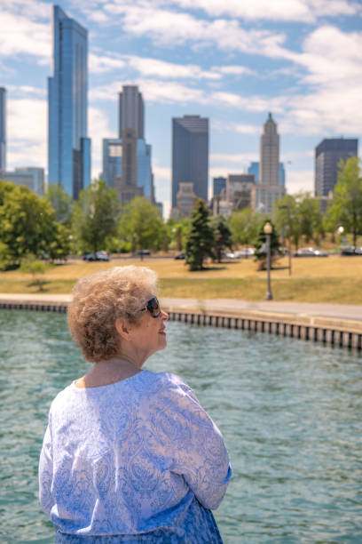 istock senior woman visits Chicago, Illinois 1342180785