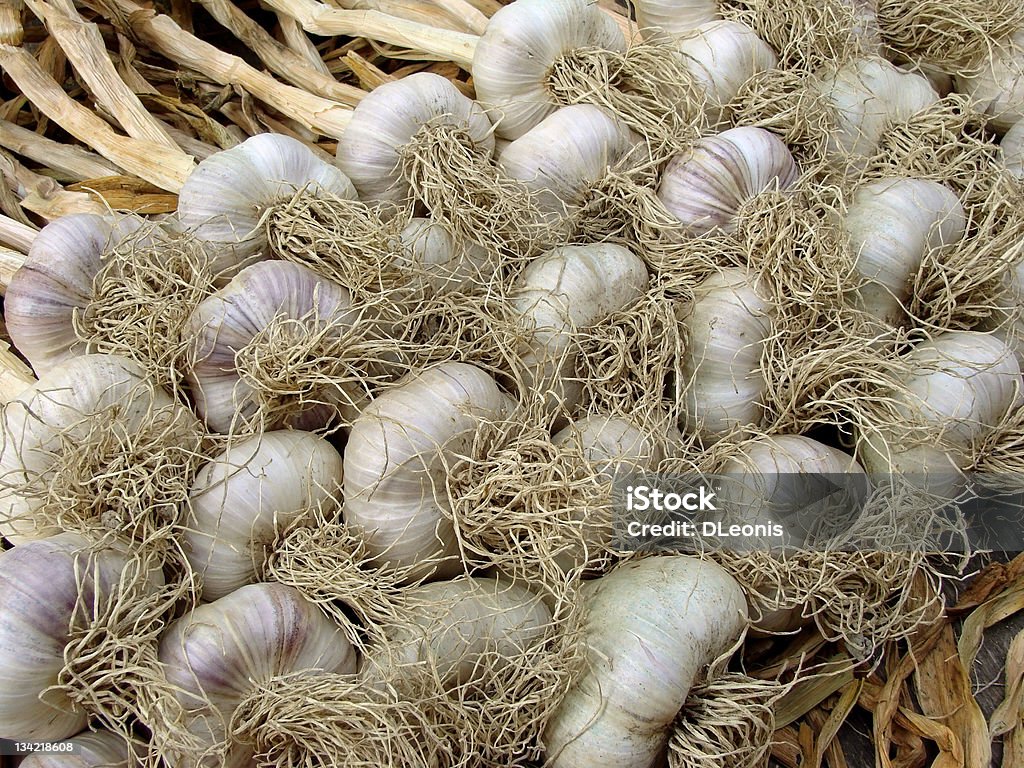 garlic bulbs amount of garlic bulbs lying one on another Agriculture Stock Photo