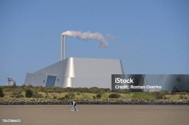 Covanta Plant Against Clear Blue Sky Seen From Sandymount Beach Stock Photo - Download Image Now