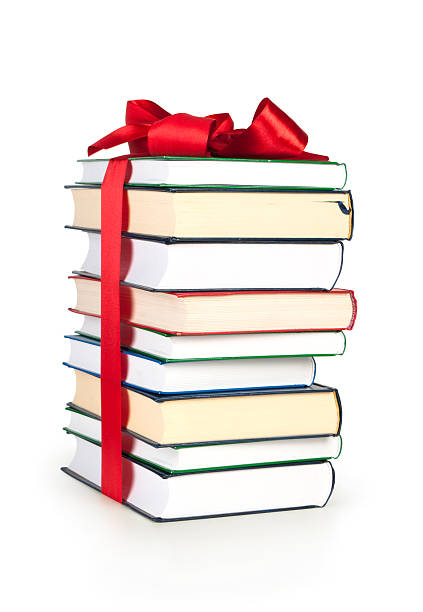 istock stack of book with ribbon like a gift 134218967