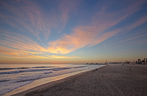 Pink and orange sunset at Port Hueneme beach in Oxnard California United States