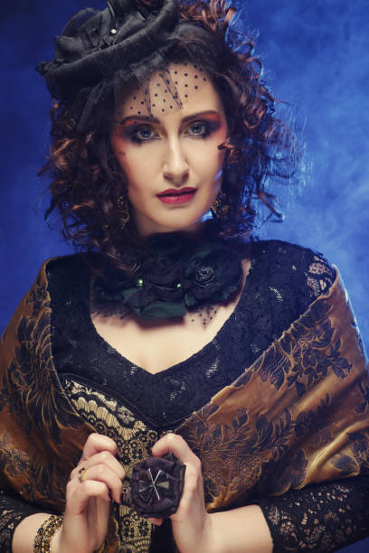 istock Beautiful lady with artistic make-up. Curly hair. Luxury style 1342190884